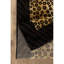 Tapis de 221 cm de long et 152 cm de large, beige et noir, de style rustique et sauvage, tissé à la machine en polypropylène à motif léopard.