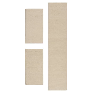 Handgefertigter Teppich Pinney aus Wolle in Beige