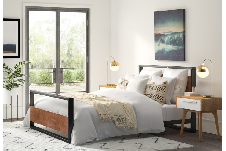 White bedroom with modern bedding