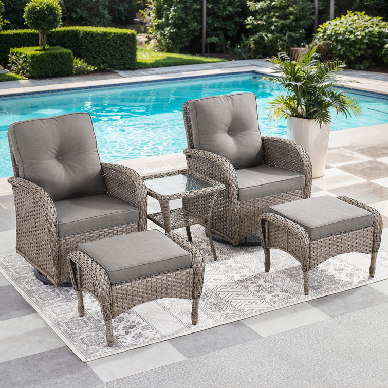 Keywest 2 - Person Outdoor Seating Group PE Wicker Swivel Glider With Ottomans With Cushions With Side Table