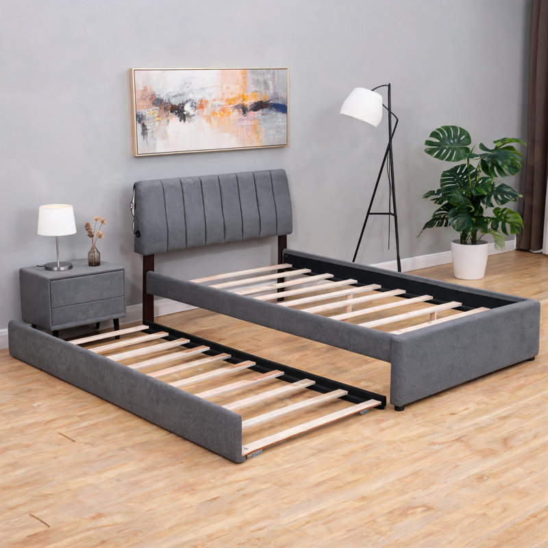 Gray teddy bear plush platform bed, full size, with built-in pull-out single extendable bed design.