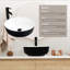 Lavabo de salle de bain vasque circulaire en céramique noire avec robinet-729116801
