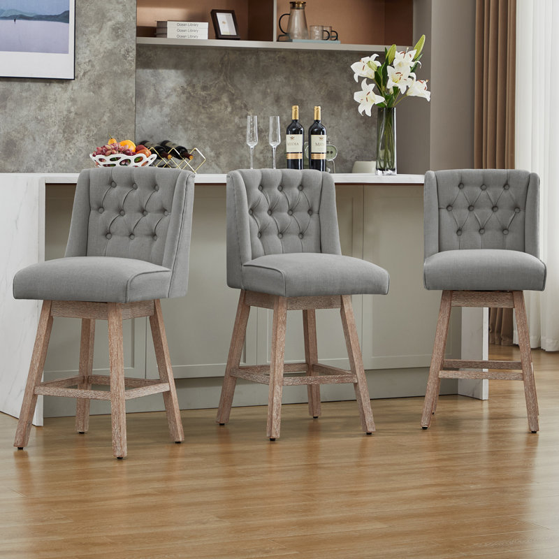 Tabouret de bar pivotant à 360 ° Terron avec pieds en bois massif Terron, Gris