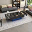 Table basse noire extensible avec plateau coulissant et compartiment de rangement caché