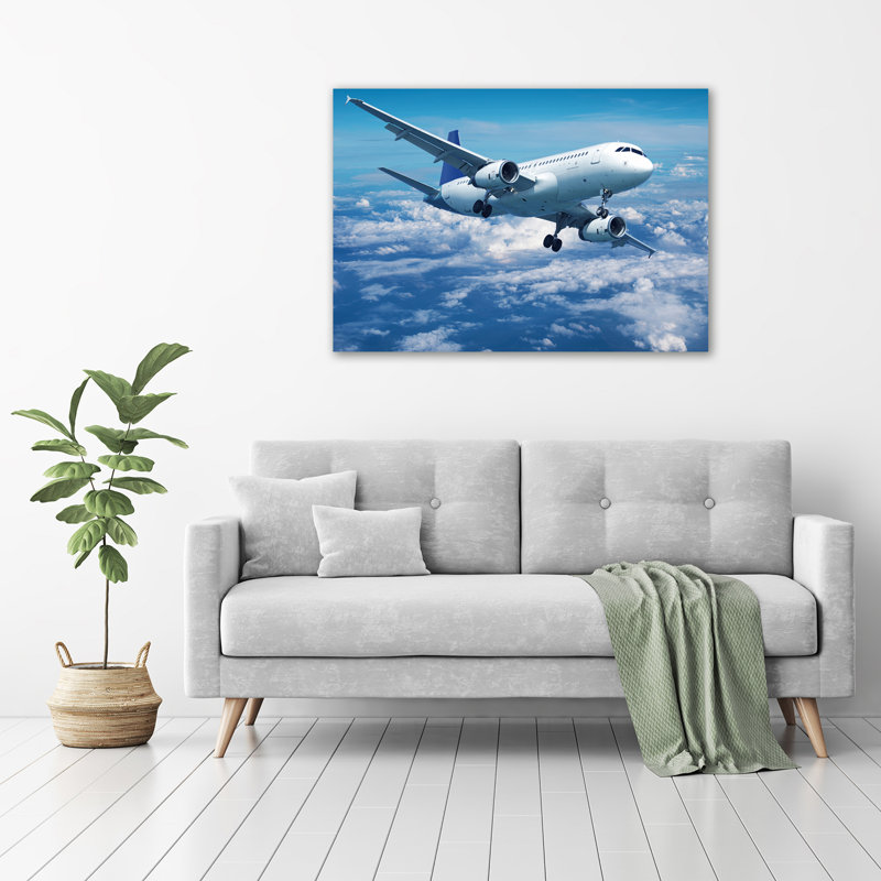 Airplane In The Clouds - Wrapped Canvas Print