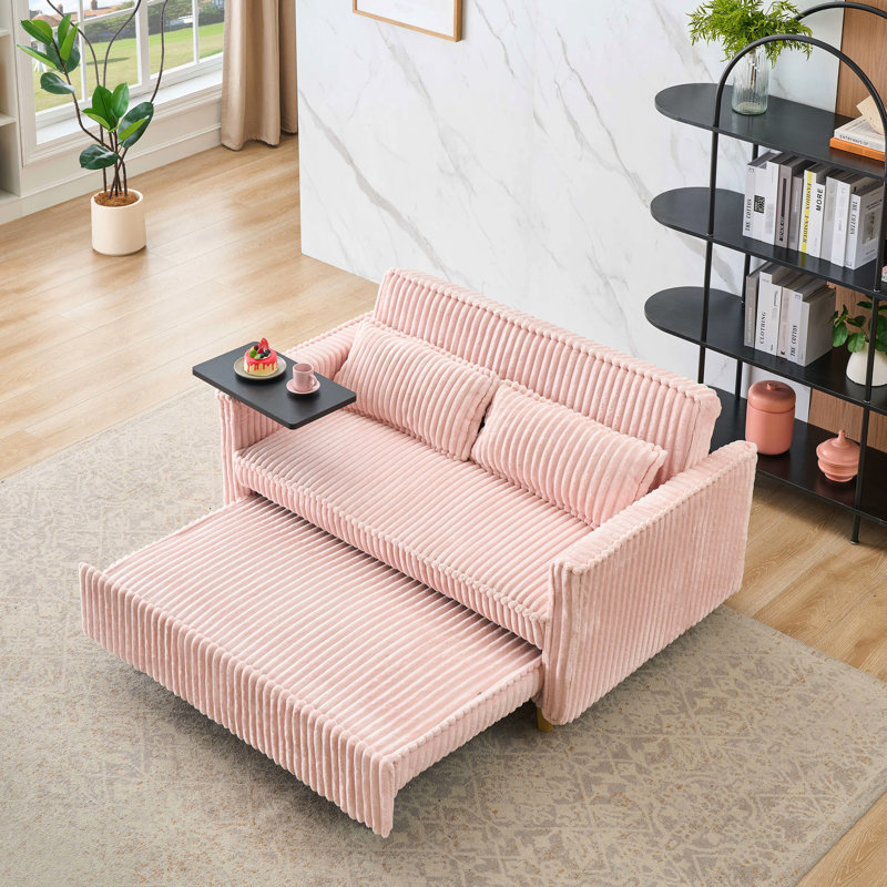 Velours côtelé rose avec choix polyvalents: fonction coulissante, plateau de table mobile, ports pour un espace personnalisable Ajouts innovants: mécanisme, expérience unique