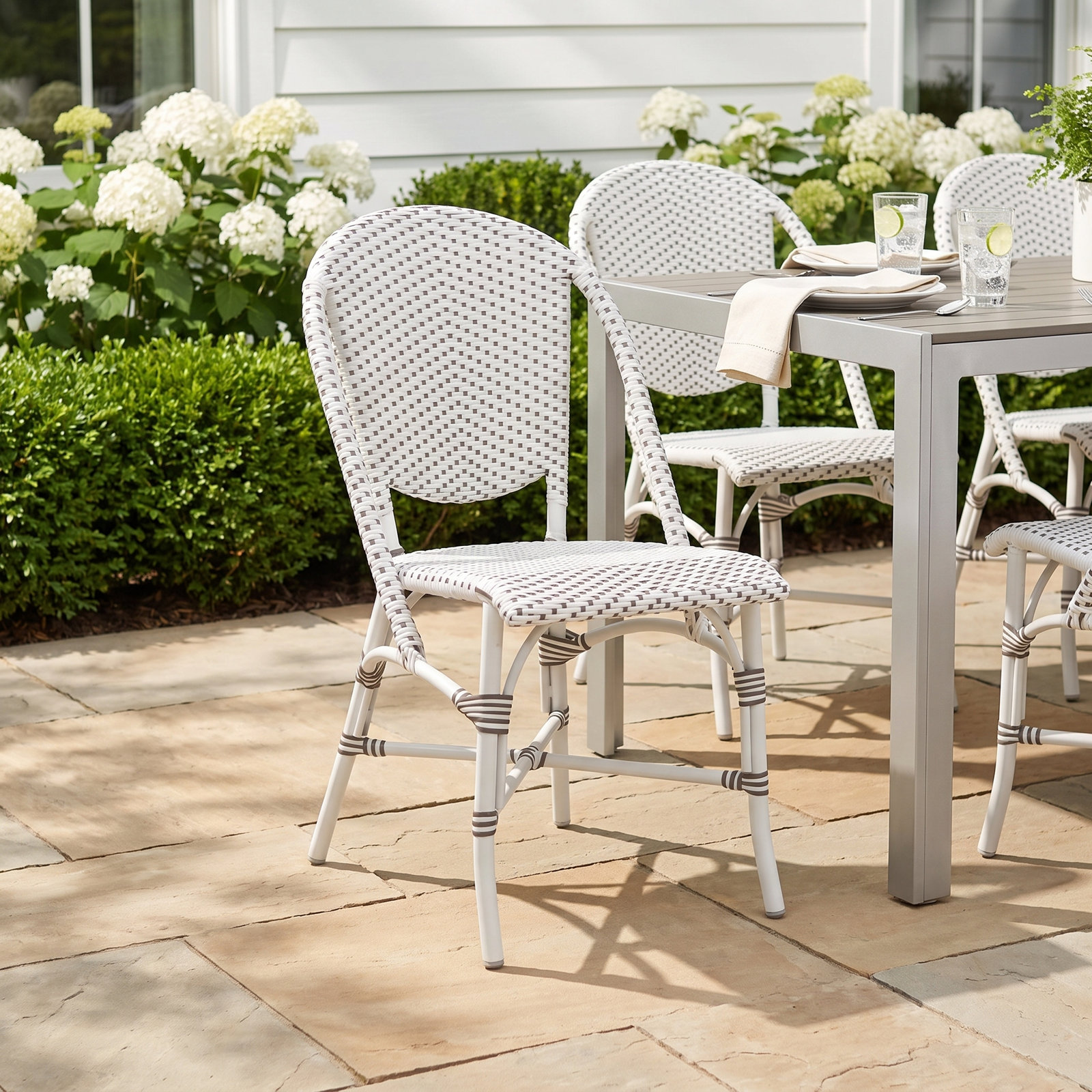 Sofie Stackable Patio Side Chair, White with Cappuccino Dots