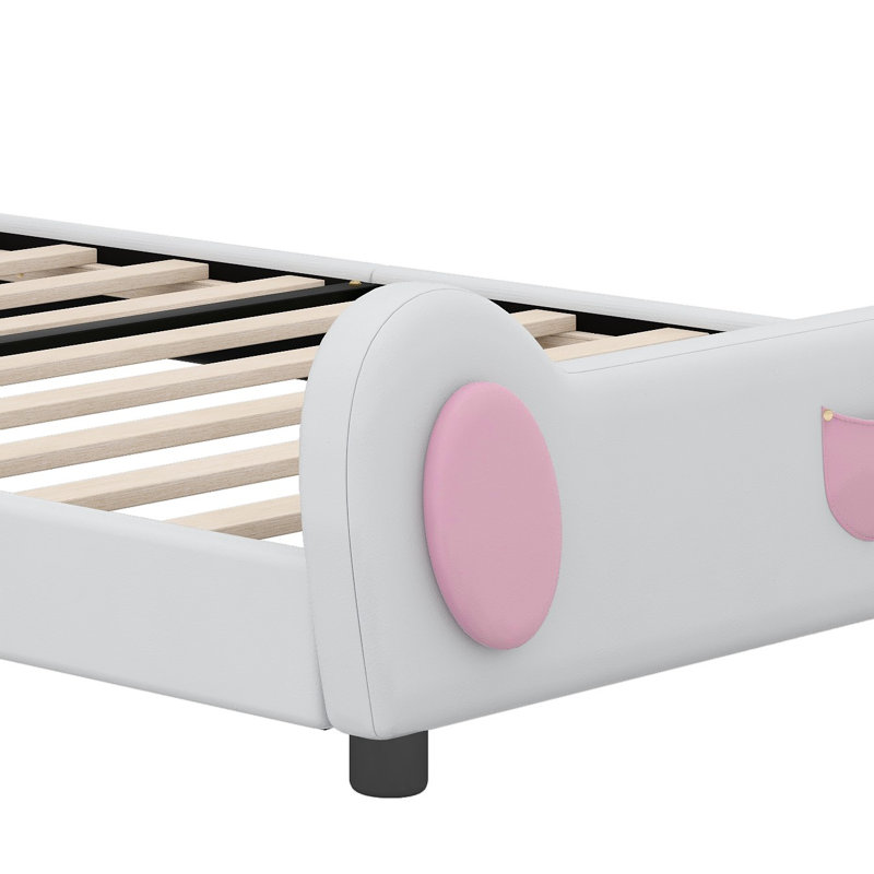 Lit plateforme tapissier avec tête de lit en forme de lapin