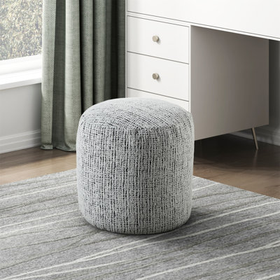 Repose-pieds cylindrique rembourré en tissu de chenille