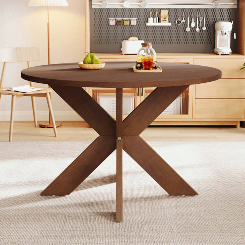 Table de salle à manger ronde de style campagne moderne, peu encombrante et polyvalente pour des sièges confortables