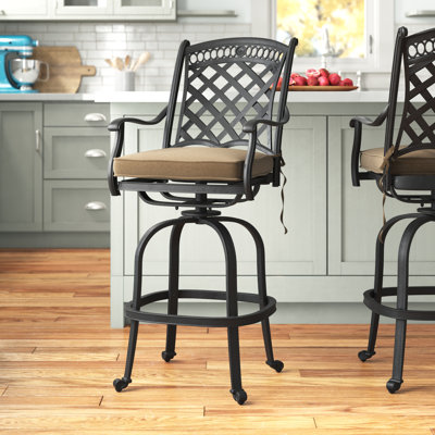Wildermuth Swivel Upholstered Counter Stool with Metal Frame