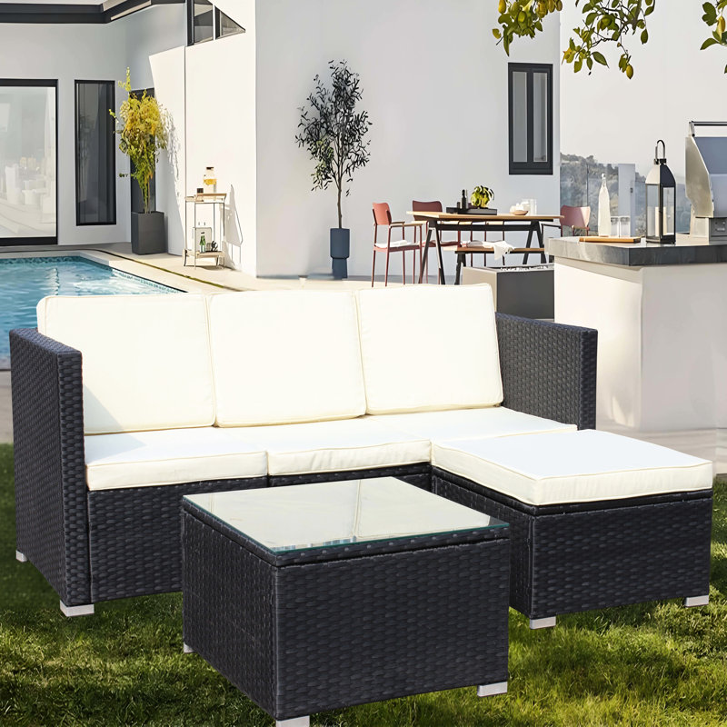 Solution pour l'extérieur: PE, coussins beiges, table: coussins et verre trempé