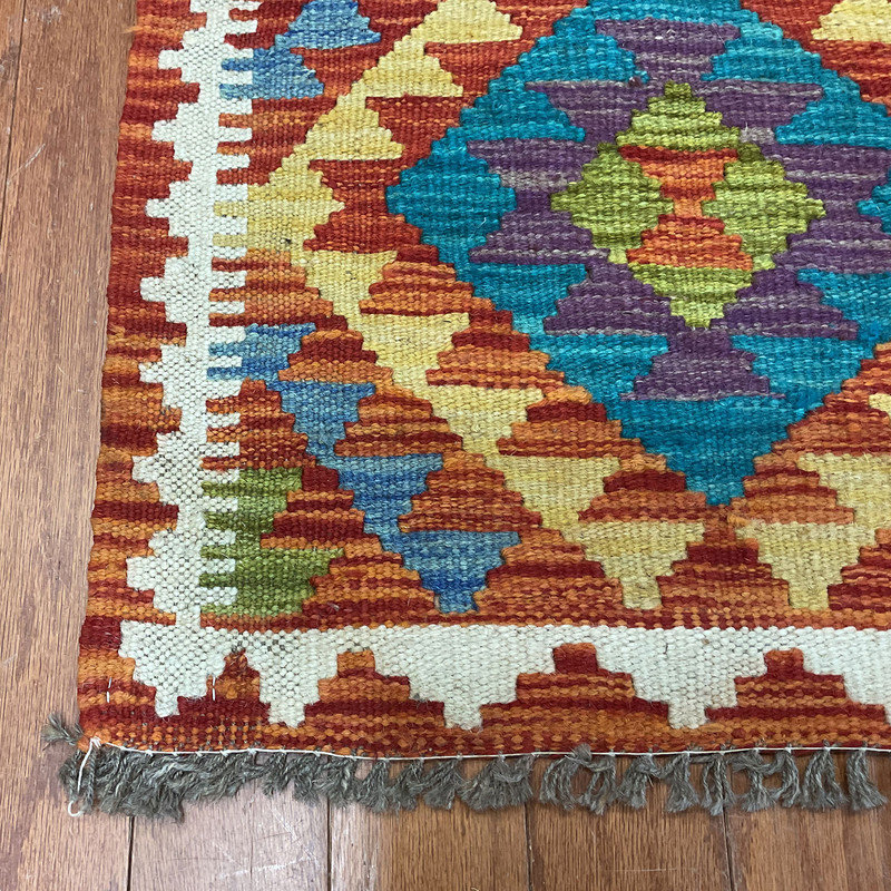 Tapis bleu / brun / vert unique de 1 pi 8 po Jhonni