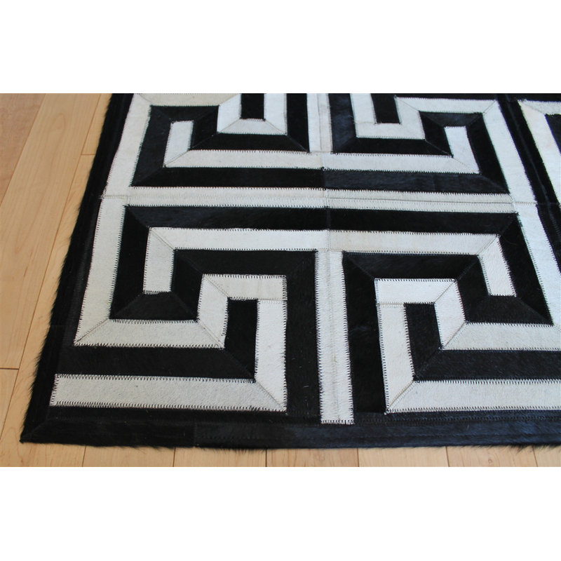 Handmade Black and White Geometric Cowhide Rug 4' x 6'