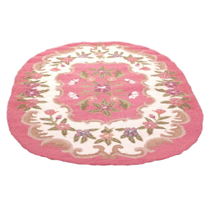 Tapis ovale rose en laine tissé à plat à motif floral Maeve