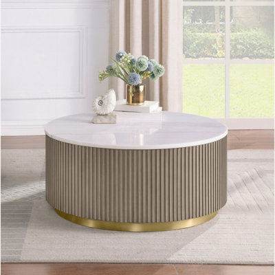 Table basse ronde avec dessus en marbre blanc