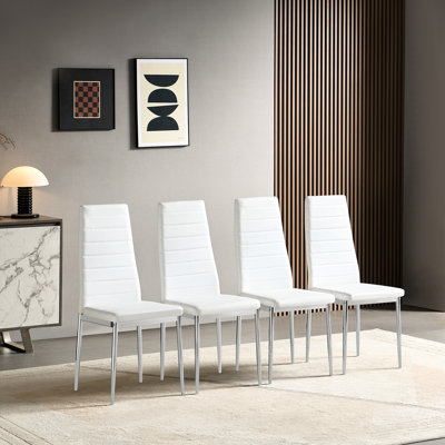 Chaise de salle à manger moderne 4 pièces en cuir synthétique doux et pieds argentés élégants, idéale pour les petites tables confortables