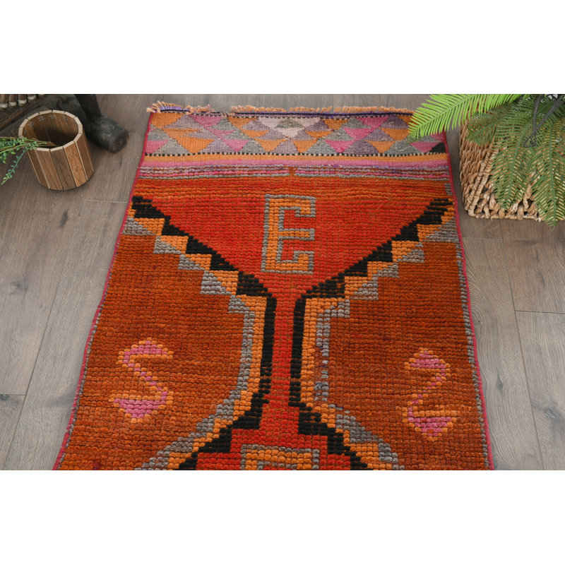 Tapis géométrique orange en laine 33,1 x 121,3 po