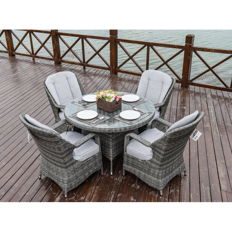 Anikha 4 - Person Wicker Patio Dining Set with Round Table , Cushions Included, Gray, Gray