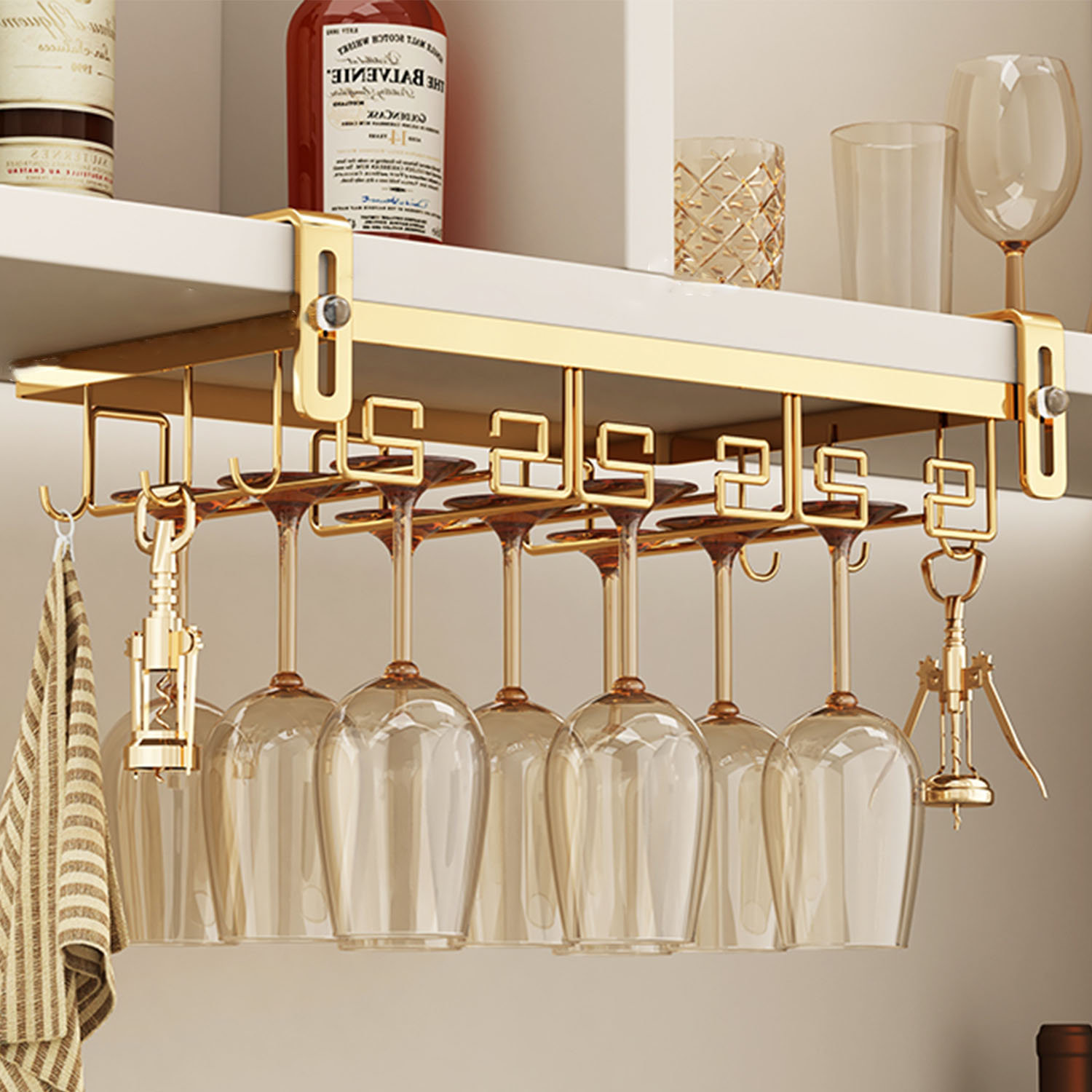 https://assets.wfcdn.com/im/11799084/compr-r85/2563/256353082/orlidia-hanging-wine-glass-rack-in-gold.jpg