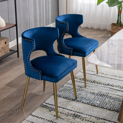 Fauteuil à oreilles en velours khanya