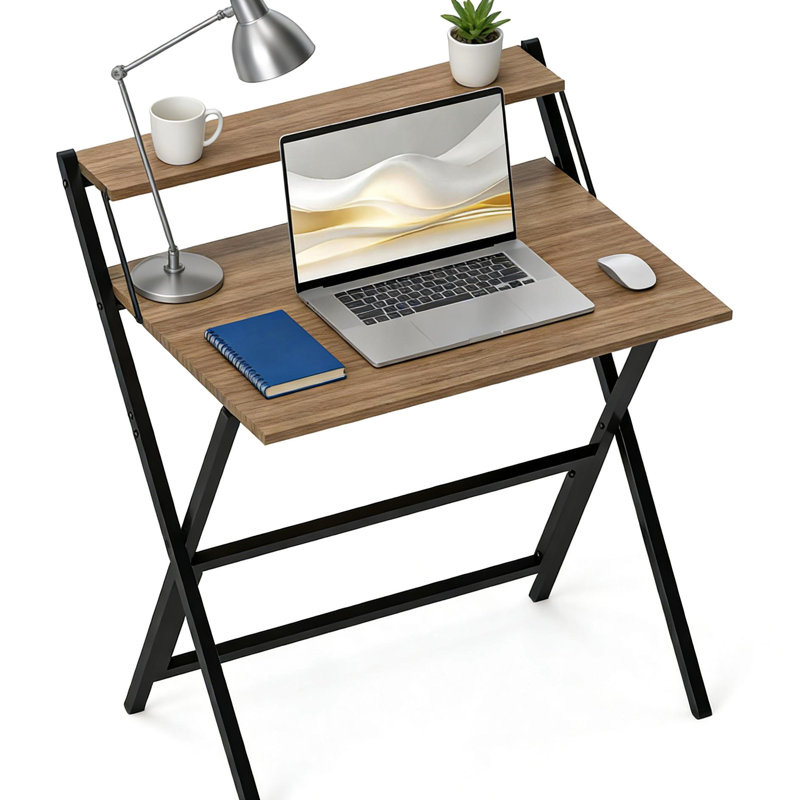Bureau pliant compact avec tablette pour écran, idéal pour les petites pièces. Finition noyer. Structure en acier en forme de X et installation facile.