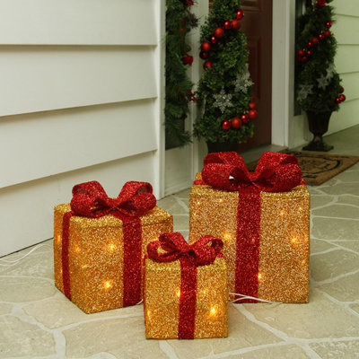 Boîtes-cadeaux de Noël or et rouge