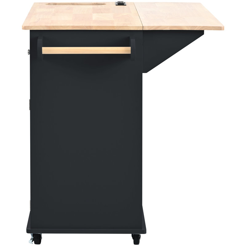 Black Kitchen Cart With Power Outlet And Drop Leaf. Large Capacity, Wine Rack. Construction Easy Mobility Incorporated Island In Black. Down Leaf Function, Cellar, Space Solution