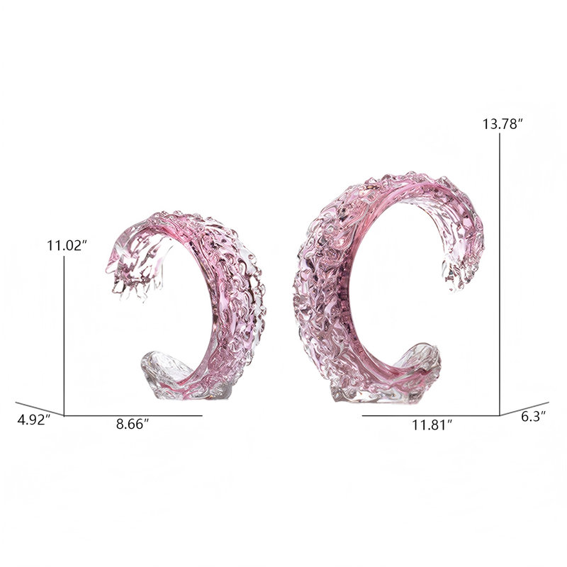 Une paire d'ornements modernes en cristal de luxe rose clair