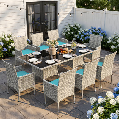 Ensemble de salle à manger 10 pièces en rotin pour l'extérieur avec coussins, 8 fauteuils et 2 tables à plateau en verre trempé