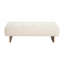 Banc de repose-pieds rectangulaire en lin capitonné avec pieds en bois massif pour un siège et un rangement multifonctionnels.