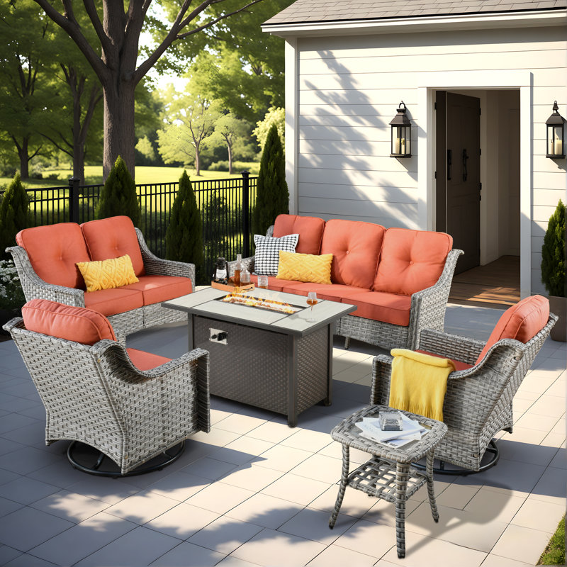 Demariea Outdoor Wicker 7 Person Seating Group With Fire Pit Table With Rocking And Swivel Chairs, Red