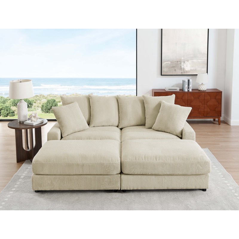 Arzuaga 89" Wide Reversible Modular Corner Sectional with Ottoman, Ivory, Black, Plastic