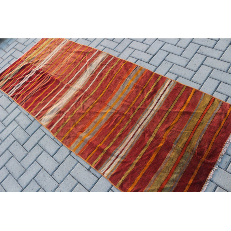 Tapis turc rayé en laine fabriqué à la main dans des tons rouges pour un décor bohémien et un tapis turc en tissu biologique