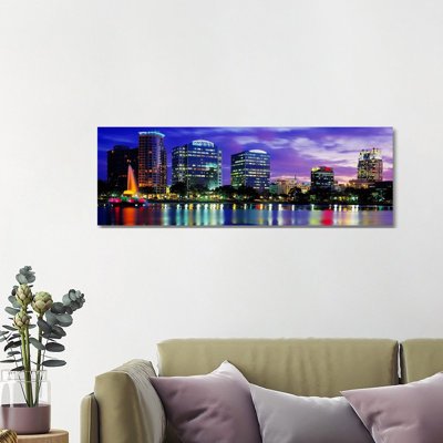 An Urban Skyline At Night, Orlando, Florida, USA - Wrapped Canvas Panoramic Print