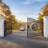 14 ft. W Steel Dual Swing Driveway Gate with Posts - Tree Style