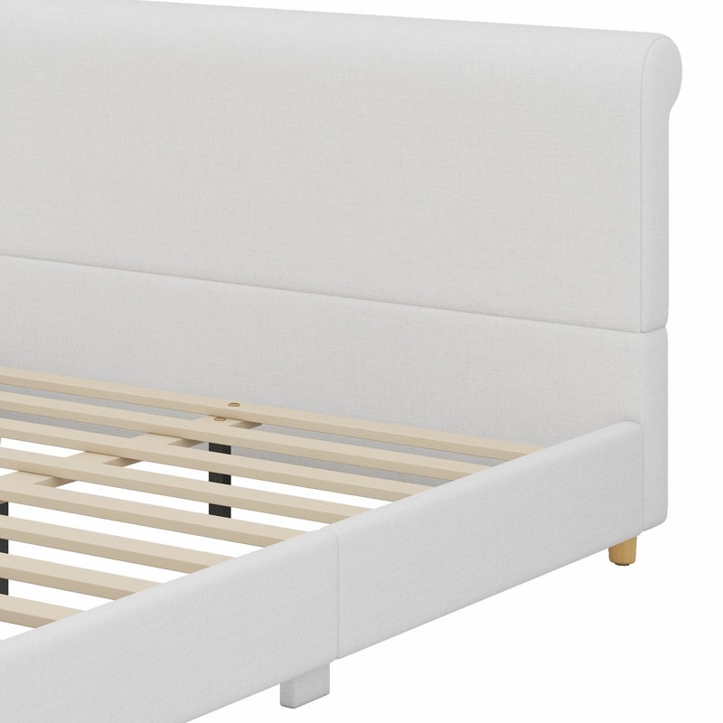 Platform bed frame with classic sleigh silhouette and high headboard anchors traditional bedrooms, Queen