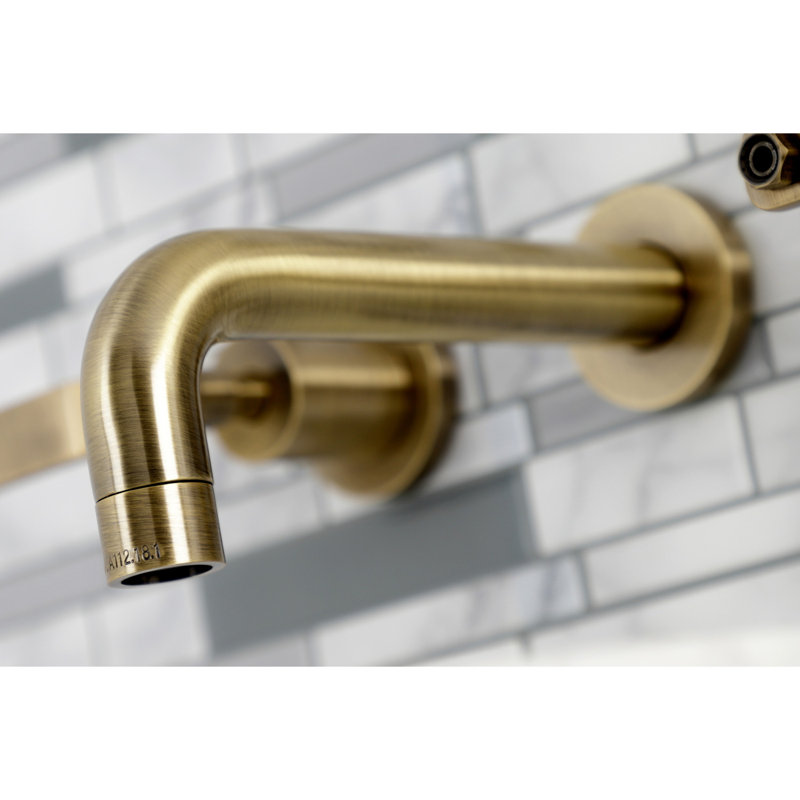 Kingston Brass Whitaker Two-Handle 3-Hole Wall Mount Bathroom Faucet, Antique Brass
