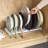 YouCopia StoreMore® Cookware Rack, Heavy-Duty Pot, Cast Iron, Pan and Lid Organizer with 9 Adjustable Slots for Kitchen Cabinet Storage, Expandable Length, Organizing Hero Collection