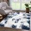 Tapis abstrait bleu tissé à la machine-69046211