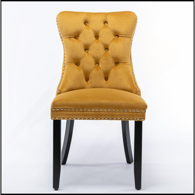 Contemporary Velvet Upholstered Dining Chair With Solid Wood Legs And Nailhead Trim, Offering Luxurious Comfort And Style.