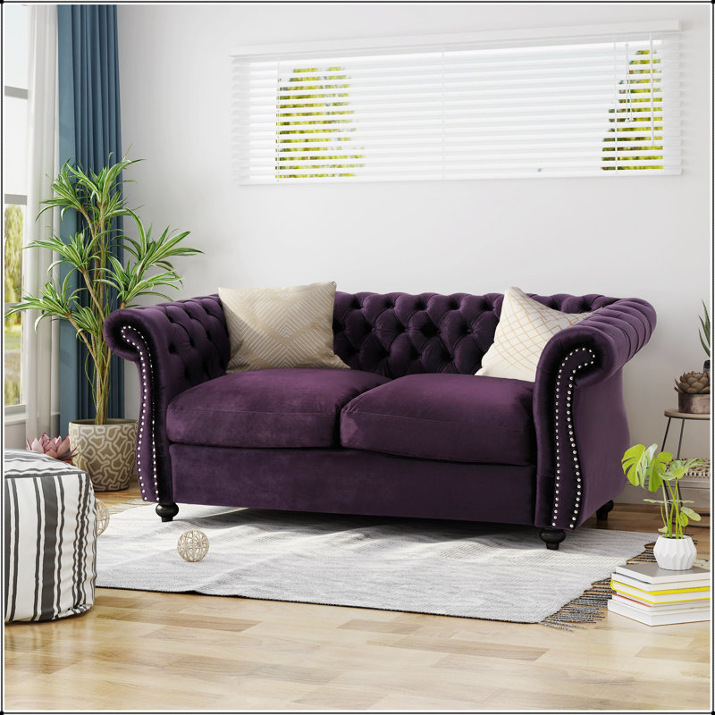 Canapé Chesterfield classique avec capitonnage à boutons profonds et détails cloutés pour une élégance et un confort intemporels