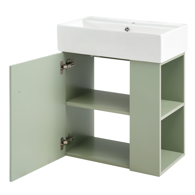 Meuble-lavabo moderne avec lavabo en céramique et porte à motif de vagues, conception murale pour une solution de rangement compacte et élégante.