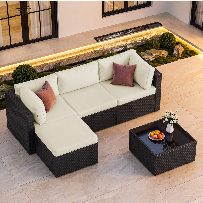 Canapé d'angle modulaire de 5 pièces en résine tressée pour terrasse, avec pouf et coussins, Beige