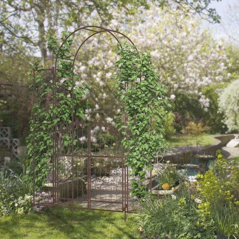 Brown Metal Garden Arbor with Fleur De Lis Motif and Gate