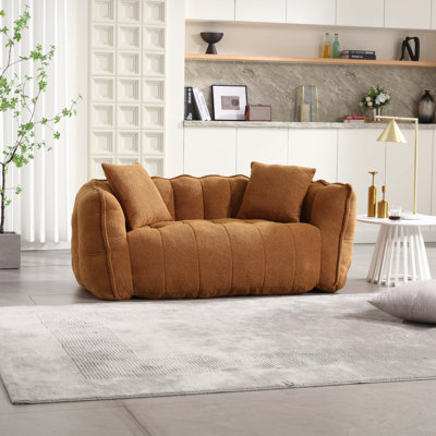 Fauteuil à billes doux avec noyau en mousse haute résilience pour deux personnes.