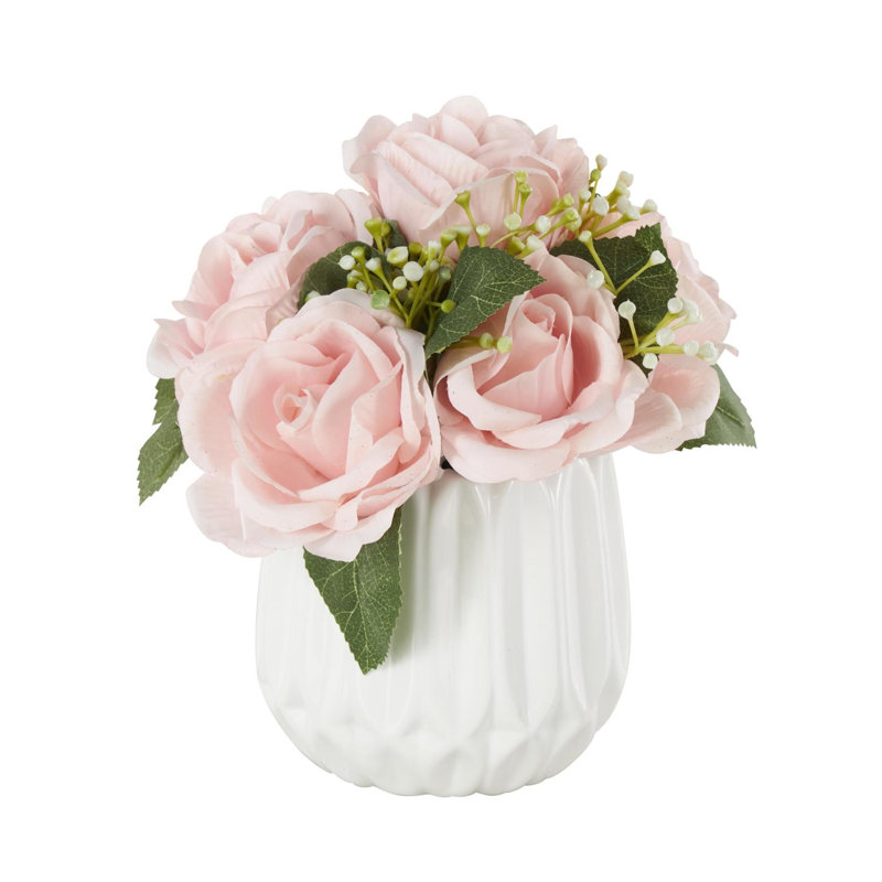 Cole et feuillage naturel en tissu gris avec feuilles vertes et vase rond en céramique
