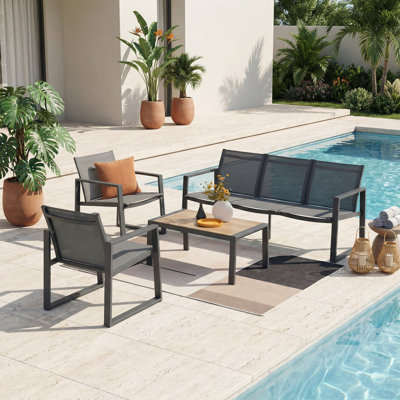 4-piece Outdoor Patio Conversation Set With Aluminum Frame, PVC-coated polyester Seating, And Spc Wood-look Coffee Table