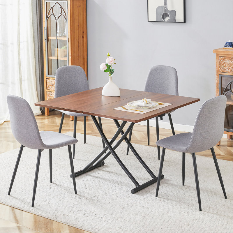Ensemble de table et de chaises. Plateforme de levage multifonctionnelle minimaliste moderne, bureau en panneau de fibres à densité moyenne, pieds en métal. Jumelé à 4 chaises.