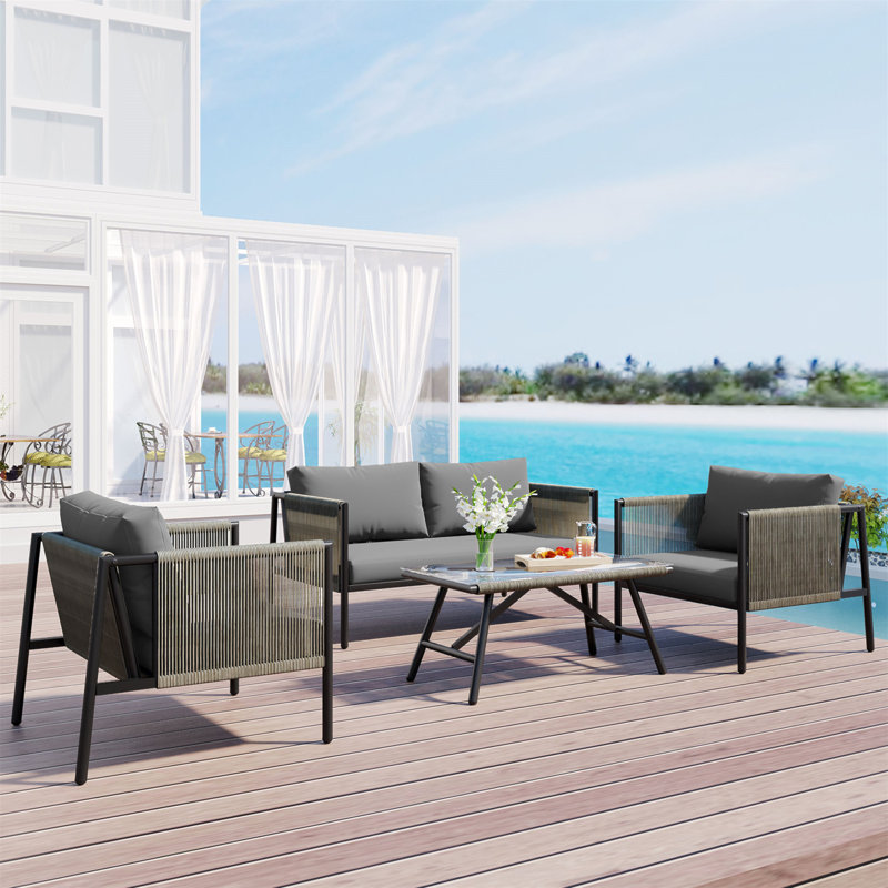 Ensemble de canapé de patio 4 personnes toutes saisons avec coussins confortables et table en verre élégante